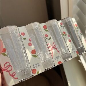 Medici Glass Shooter 4 Set with Bow Design. 2 ounce shot glasses with bow detail